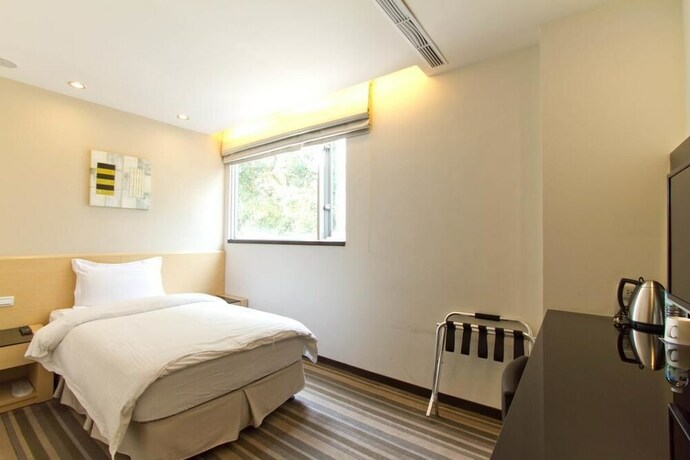 Imagen de la habitación del Hotel Haifu and Suites. Foto 25