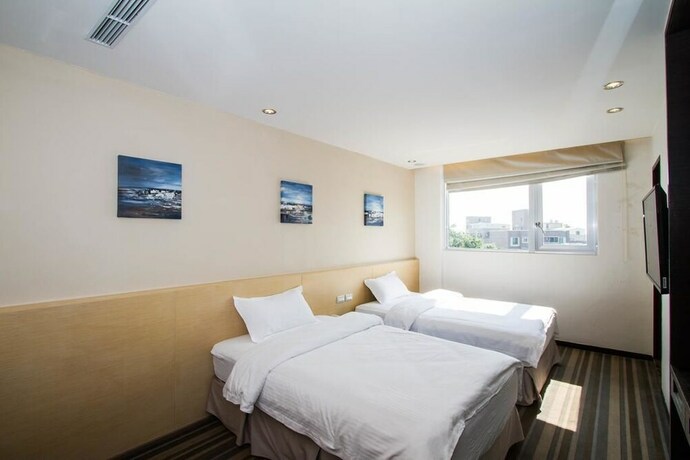 Imagen de la habitación del Hotel Haifu and Suites. Foto 26