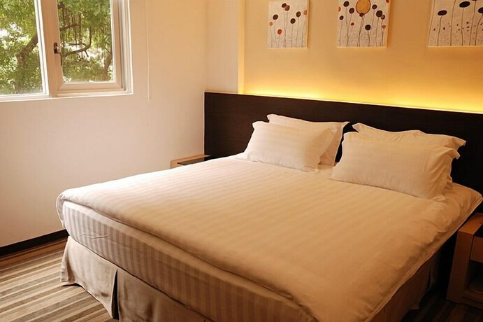 Imagen de la habitación del Hotel Haifu and Suites. Foto 28