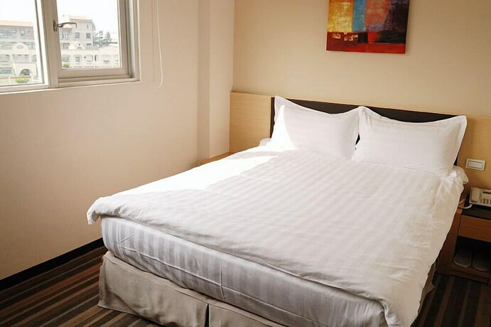 Imagen de la habitación del Hotel Haifu and Suites. Foto 34