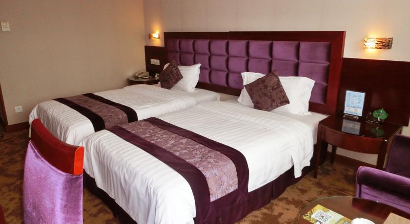 Imagen de la habitación del Hotel Haijun. Foto 4
