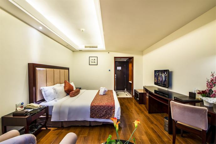Imagen de la habitación del Hotel Haikou Baofa Shengyi. Foto 4