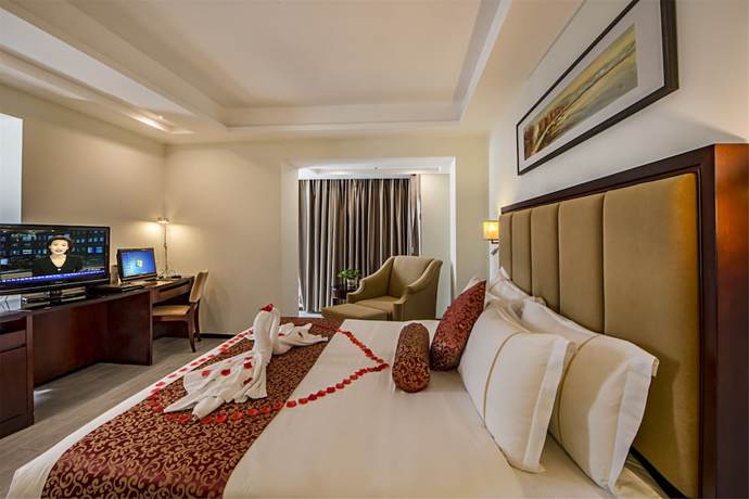 Imagen de la habitación del Hotel Haikou Baofa Shengyi. Foto 7