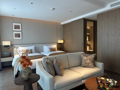 Imagen de la habitación del Hotel Haikou Hongyuan by The Crest Collection. Foto 14