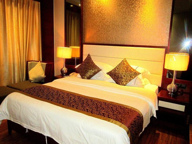 Imagen de la habitación del Hotel Haikou Kai Wei Hotel. Foto 2