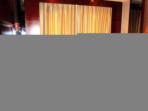 Imagen de la habitación del Hotel Haikou Kai Wei Hotel. Foto 8