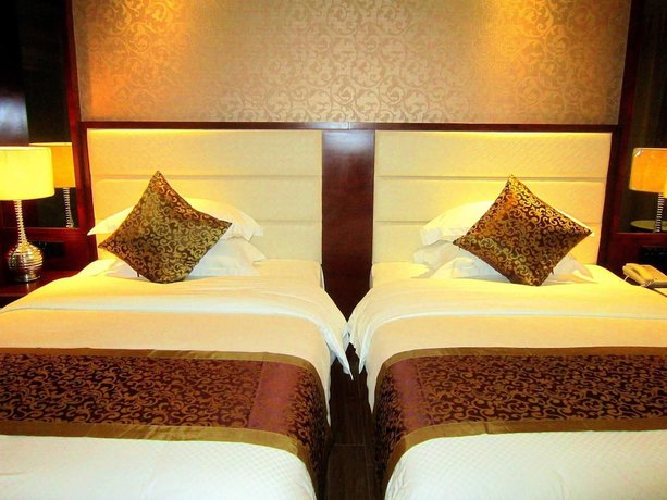 Imagen de la habitación del Hotel Haikou Kai Wei Hotel. Foto 13