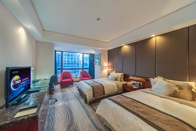 Imagen de la habitación del Hotel Haikou Mingguang Shengyi. Foto 2