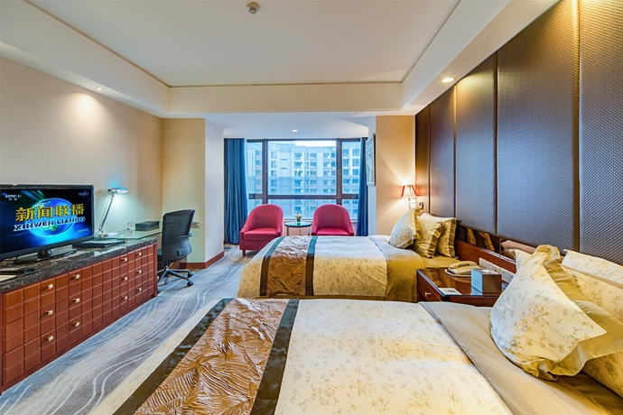 Imagen de la habitación del Hotel Haikou Mingguang Shengyi. Foto 3