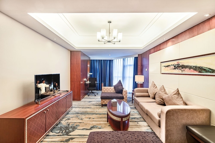 Imagen de la habitación del Hotel Haikou Mingguang Shengyi. Foto 4