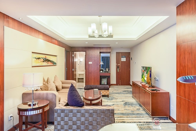 Imagen de la habitación del Hotel Haikou Mingguang Shengyi. Foto 5