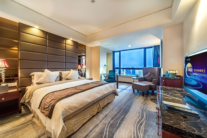 Imagen de la habitación del Hotel Haikou Mingguang Shengyi. Foto 8