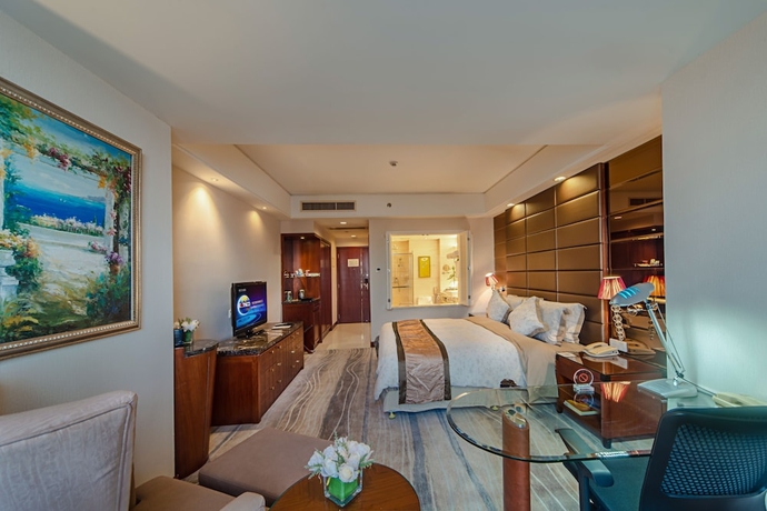 Imagen de la habitación del Hotel Haikou Mingguang Shengyi. Foto 9
