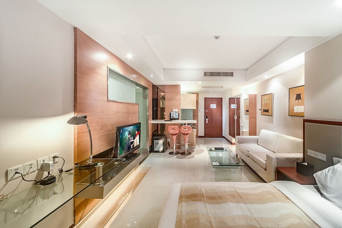 Imagen de la habitación del Hotel Haikou Mingguang Shengyi. Foto 10