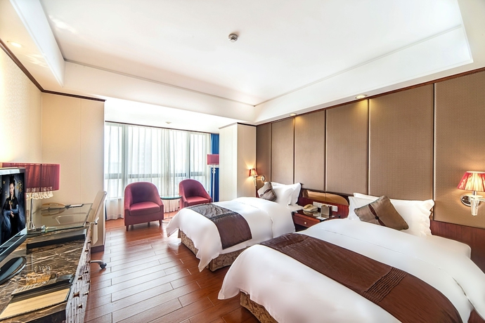 Imagen de la habitación del Hotel Haikou Mingguang Shengyi. Foto 14