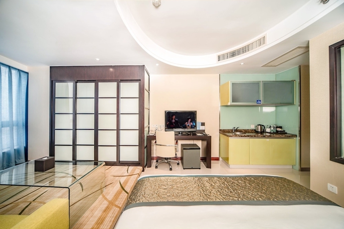 Imagen de la habitación del Hotel Haikou Mingguang Shengyi. Foto 16