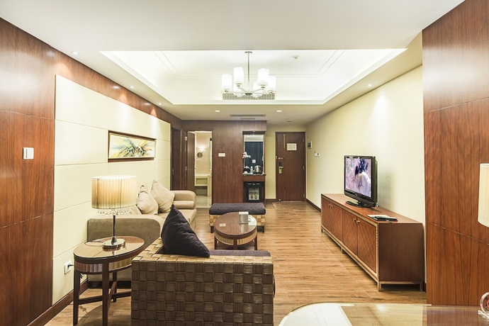 Imagen de la habitación del Hotel Haikou Mingguang Shengyi. Foto 17