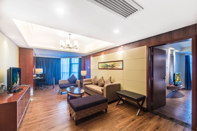 Imagen de la habitación del Hotel Haikou Mingguang Shengyi. Foto 18