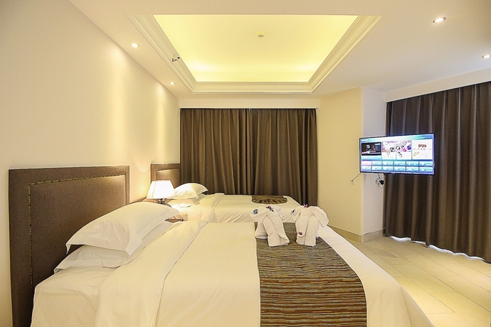 Imagen de la habitación del Hotel Haikou Tianyi International. Foto 3