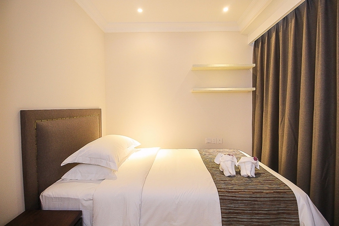 Imagen de la habitación del Hotel Haikou Tianyi International. Foto 7