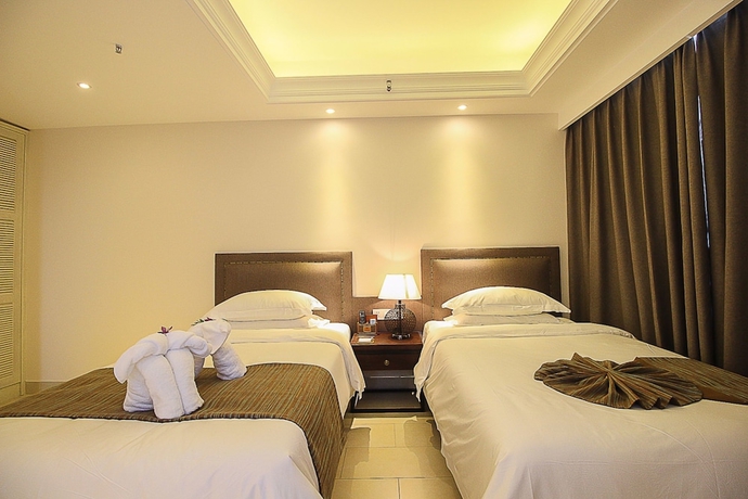 Imagen de la habitación del Hotel Haikou Tianyi International. Foto 9