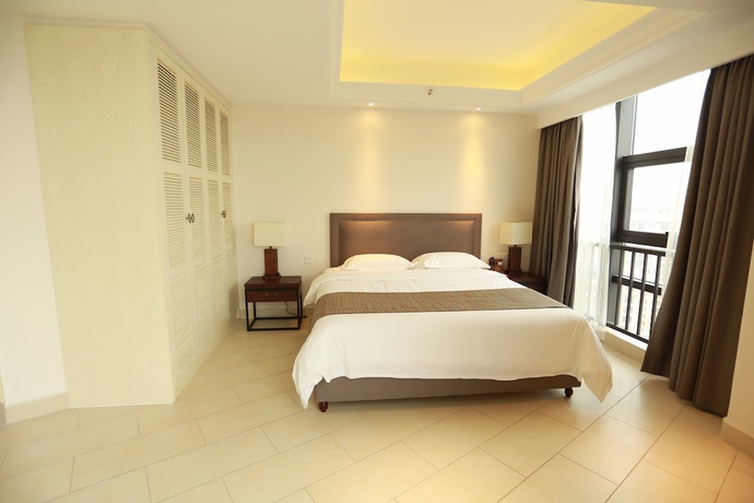 Imagen de la habitación del Hotel Haikou Tianyi International. Foto 11