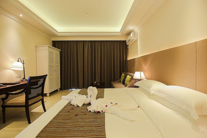 Imagen de la habitación del Hotel Haikou Tianyi International. Foto 12