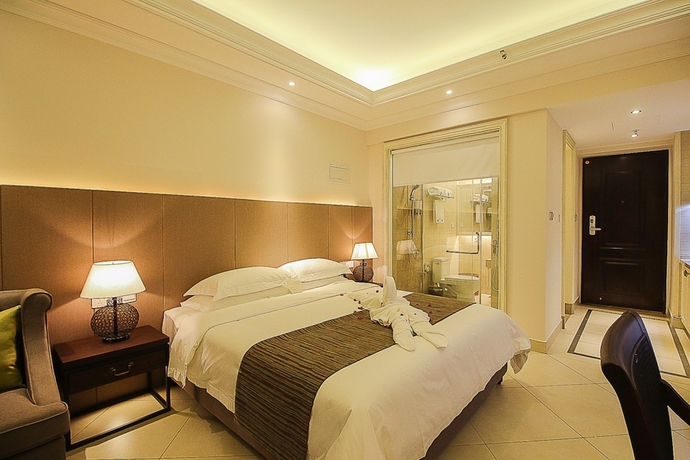 Imagen de la habitación del Hotel Haikou Tianyi International. Foto 13
