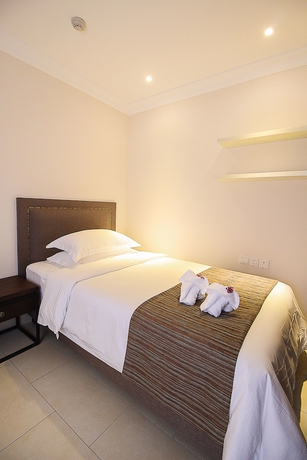 Imagen de la habitación del Hotel Haikou Tianyi International. Foto 16