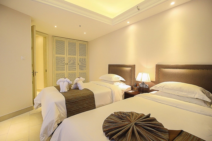 Imagen de la habitación del Hotel Haikou Tianyi International. Foto 17