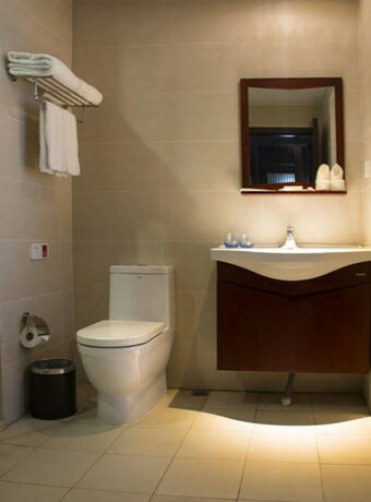 Imagen de la habitación del Hotel Haikou Zhushan Yingbin Bandao Apartment. Foto 12