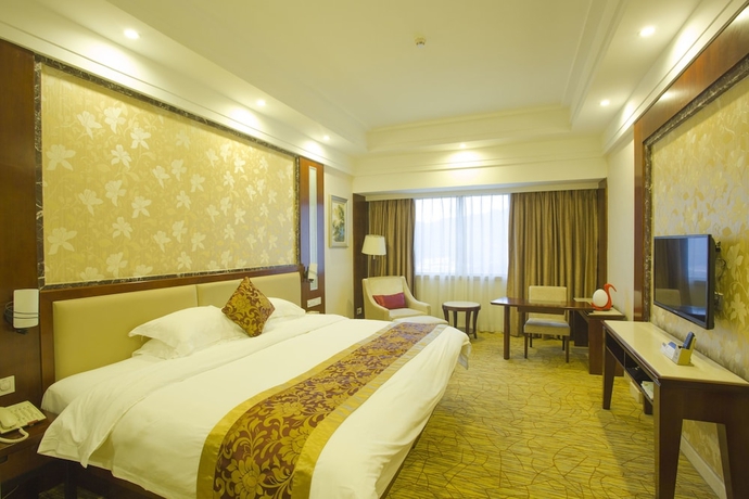 Imagen de la habitación del Hotel Haili Garden. Foto 2