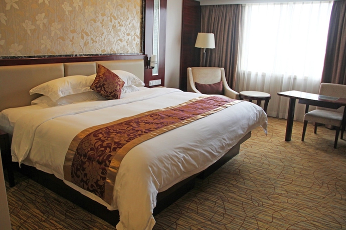 Imagen de la habitación del Hotel Haili Garden. Foto 7