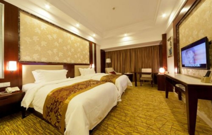Imagen de la habitación del Hotel Haili Garden. Foto 9