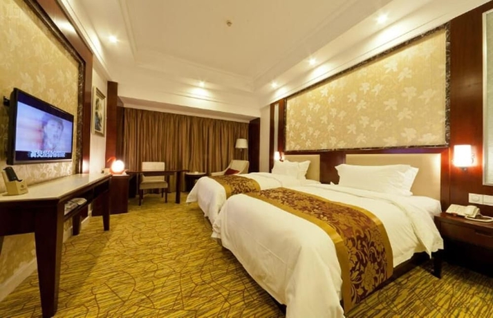 Imagen de la habitación del Hotel Haili Garden. Foto 10
