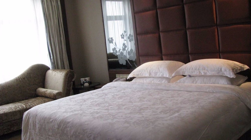 Imagen de la habitación del Hotel Hailian International. Foto 11