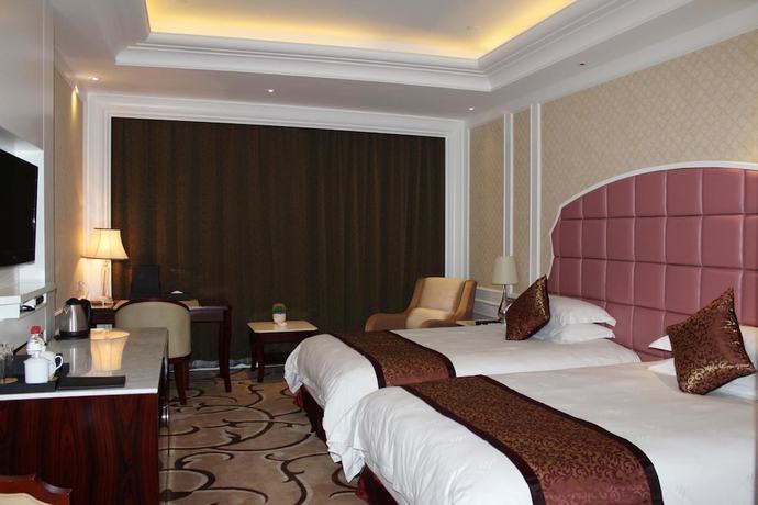 Imagen de la habitación del Hotel Haina Baichuan Hotel. Foto 2