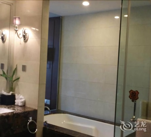 Imagen de la habitación del Hotel Haina Baichuan Hotel. Foto 3