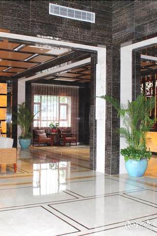 Imagen de los interiores del Hotel Haina Baichuan Hotel. Foto 18