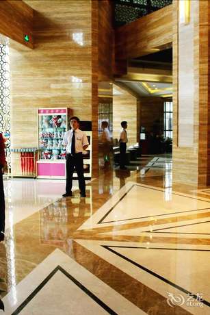 Imagen de los interiores del Hotel Haina Baichuan Hotel. Foto 19