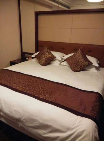 Imagen de la habitación del Hotel Haina Baichuan Hotel. Foto 7