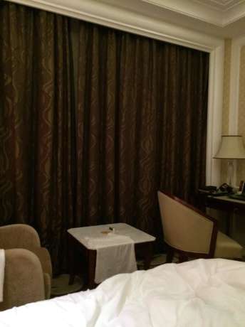 Imagen de la habitación del Hotel Haina Baichuan Hotel. Foto 8