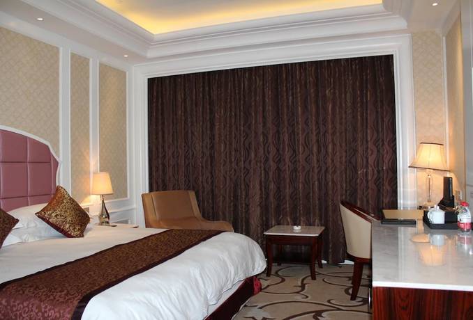 Imagen de la habitación del Hotel Haina Baichuan Hotel. Foto 9