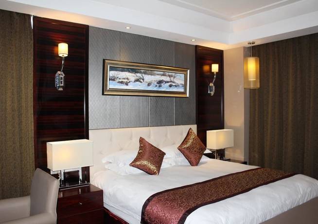 Imagen de la habitación del Hotel Haina Baichuan Hotel. Foto 10