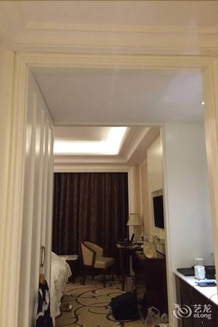 Imagen de la habitación del Hotel Haina Baichuan Hotel. Foto 11
