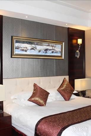 Imagen de la habitación del Hotel Haina Baichuan Hotel. Foto 12