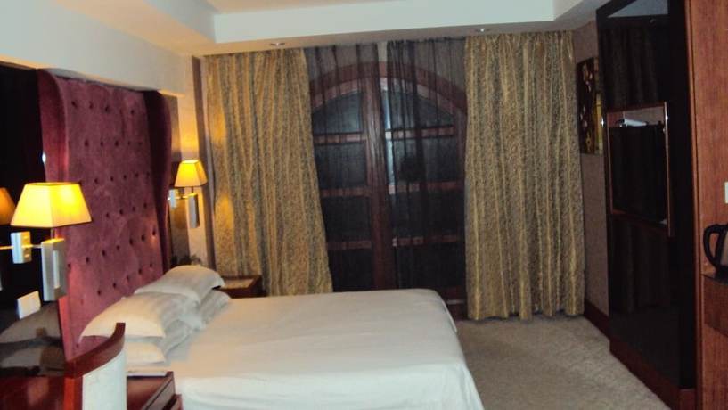 Imagen de la habitación del Hotel Haina Baichuan Hotel. Foto 15