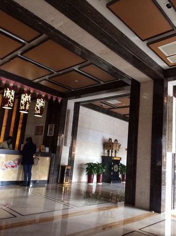 Imagen de los interiores del Hotel Haina Baichuan Hotel. Foto 20