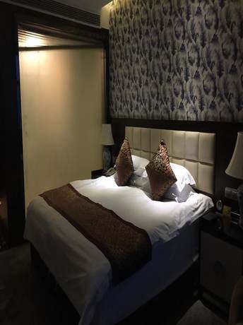 Imagen de la habitación del Hotel Haina Baichuan Hotel. Foto 16