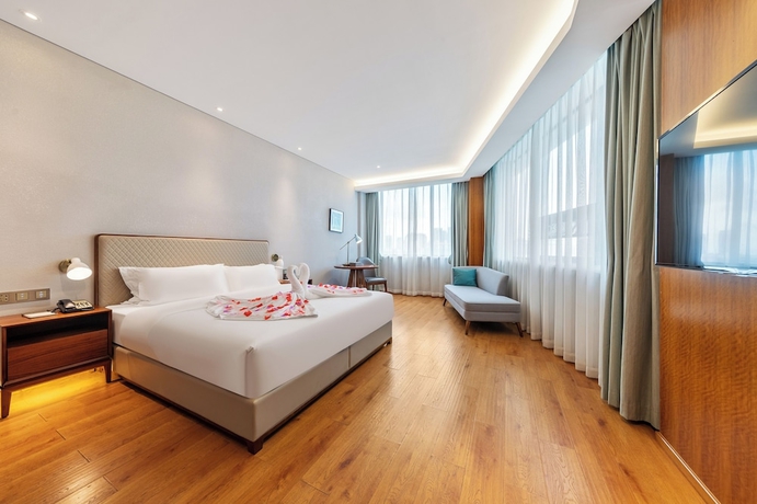 Imagen de la habitación del Hotel Hainan Berun hotel. Foto 1